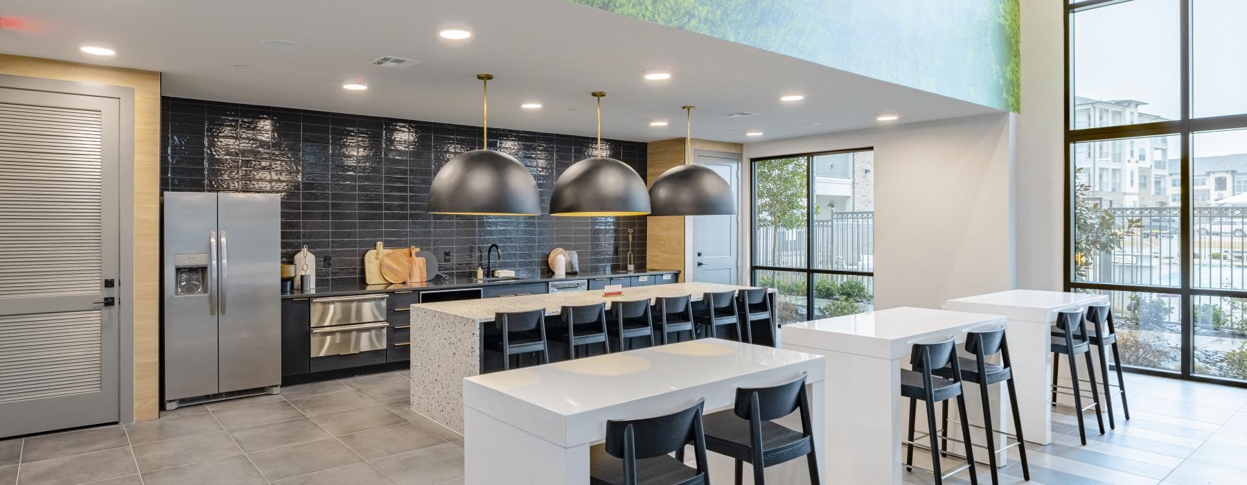 a kitchen with a tall ceiling